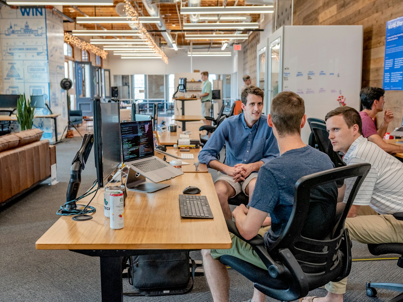 Colleagues discussing a small-business finance decision